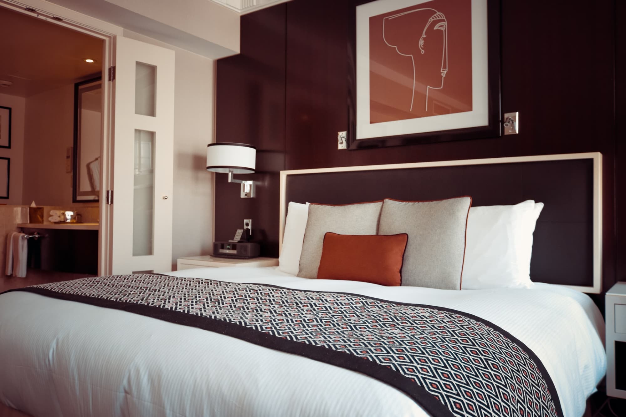 Very clean hotel bedroom with a king size bed